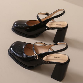 girl with green short sitting