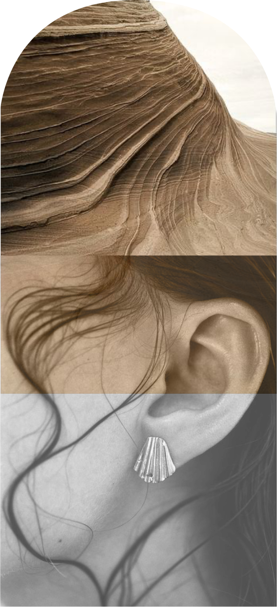 mountain melting into womans head with earing
