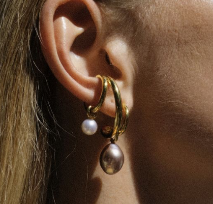 girl with green short sitting